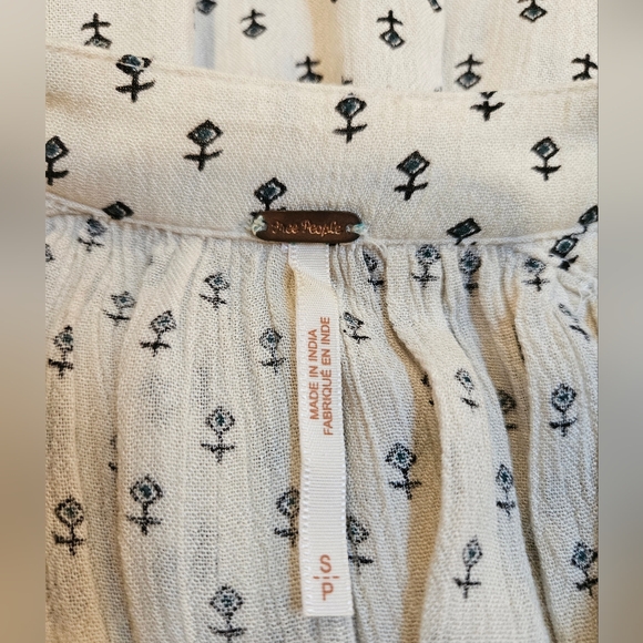 Free People | Cream Colored Tunic with Ancient Runes Pattern - Picture 8 of 9